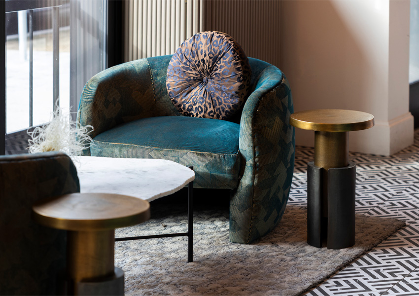 Maximialist decor in bold sitting area Design by Margarita Bravo Photography by Tahvory Bunting