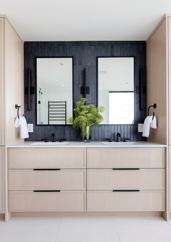 bathroom vanity with tile backsplash. Design by Knight Varga Interiors | Photography by Janis Nicolay 