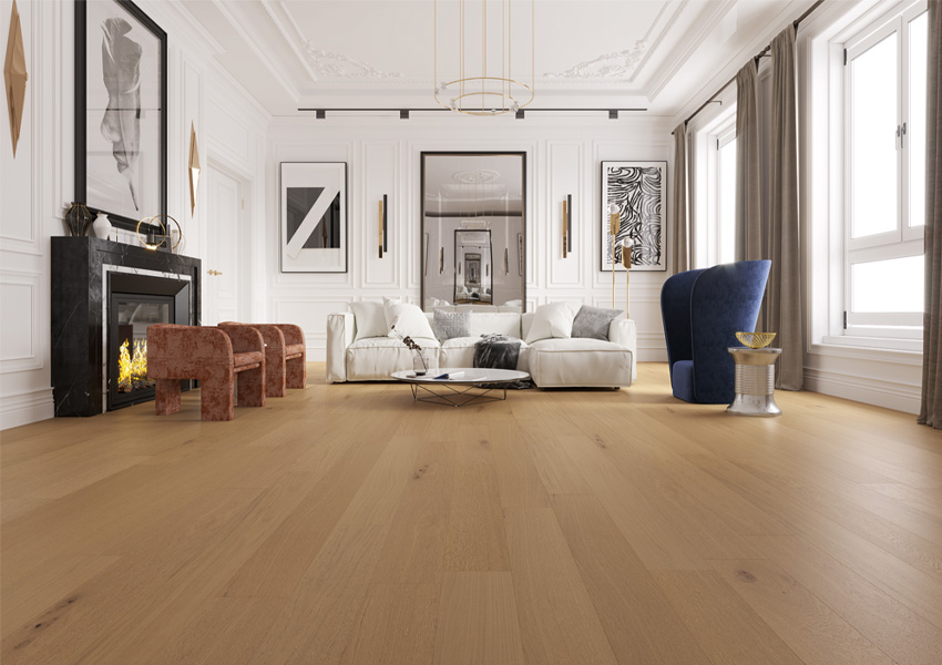 warm toned hardwood flooring in living room with couch and accent chairs with maximalist decor